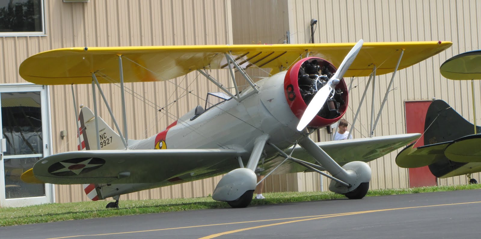 The Aero Experience Sharp Waco Follows the Sign to the Waco FlyIn