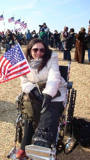 Steph in wheelchair and coat