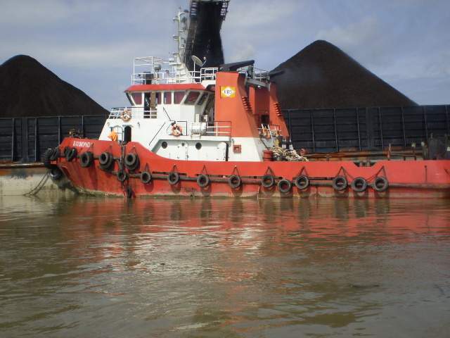 TUG AND BARGE  LOADING COAL