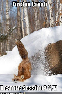 photo of a fox taking a header in the snow
