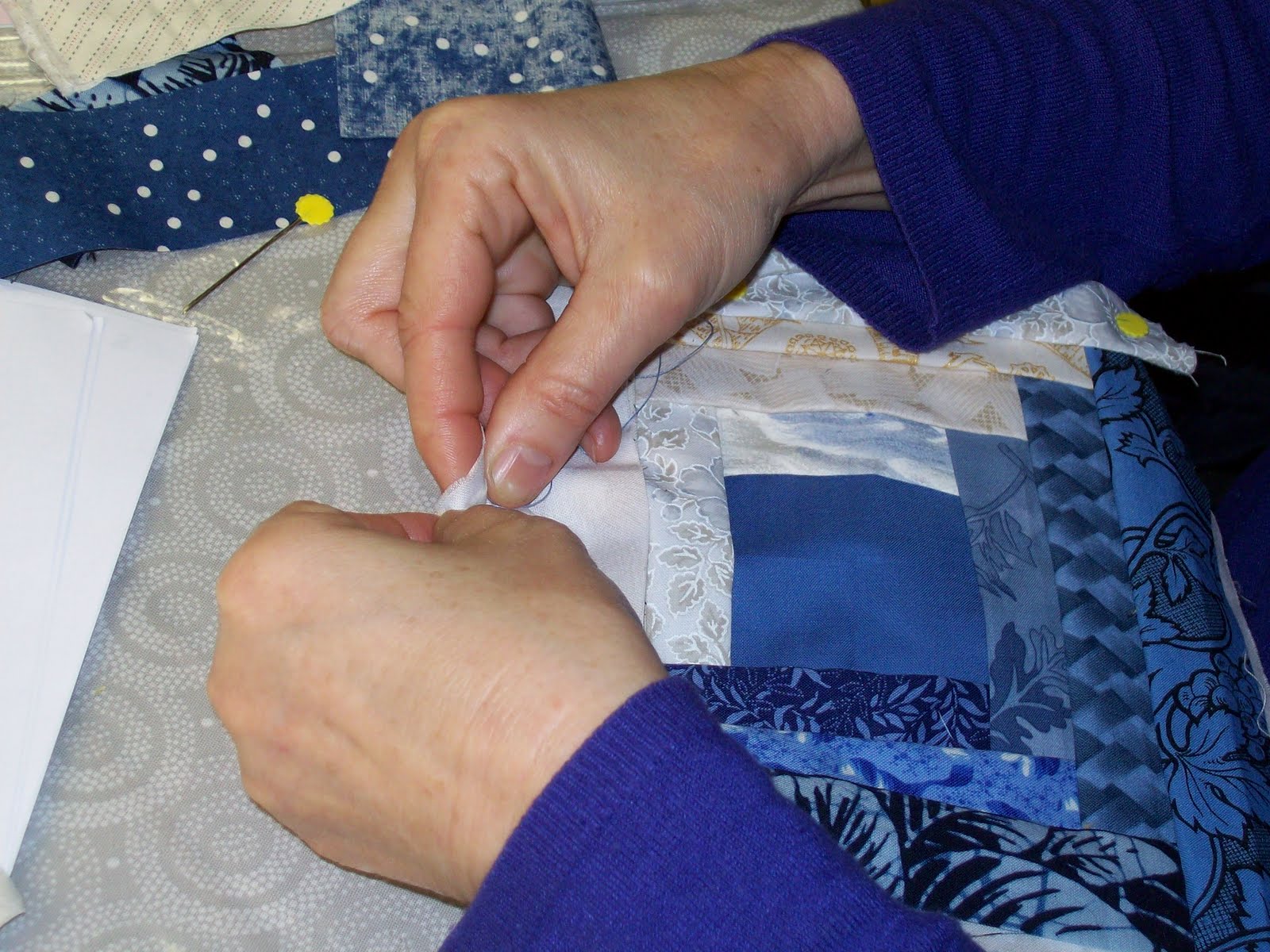 [Julies+hands+sewing.JPG]