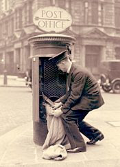 Postman and pillar box