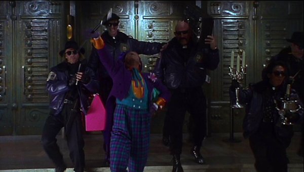 If this were 2010, the Joker would have illegally downloaded that Prince song he was blasting at the museum. Prince would have probably sued the Joker because we know how much Prince loves the Internet.