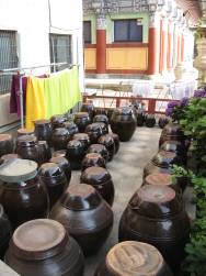 [kimchi+pots+on+patio]