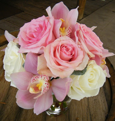 This bridal bouquet consisted of white Cymbidium Orchids pink miniCalla 
