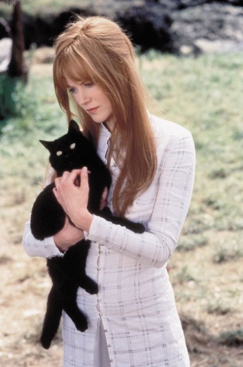 [famous_people_and_their_cats_32.jpg]