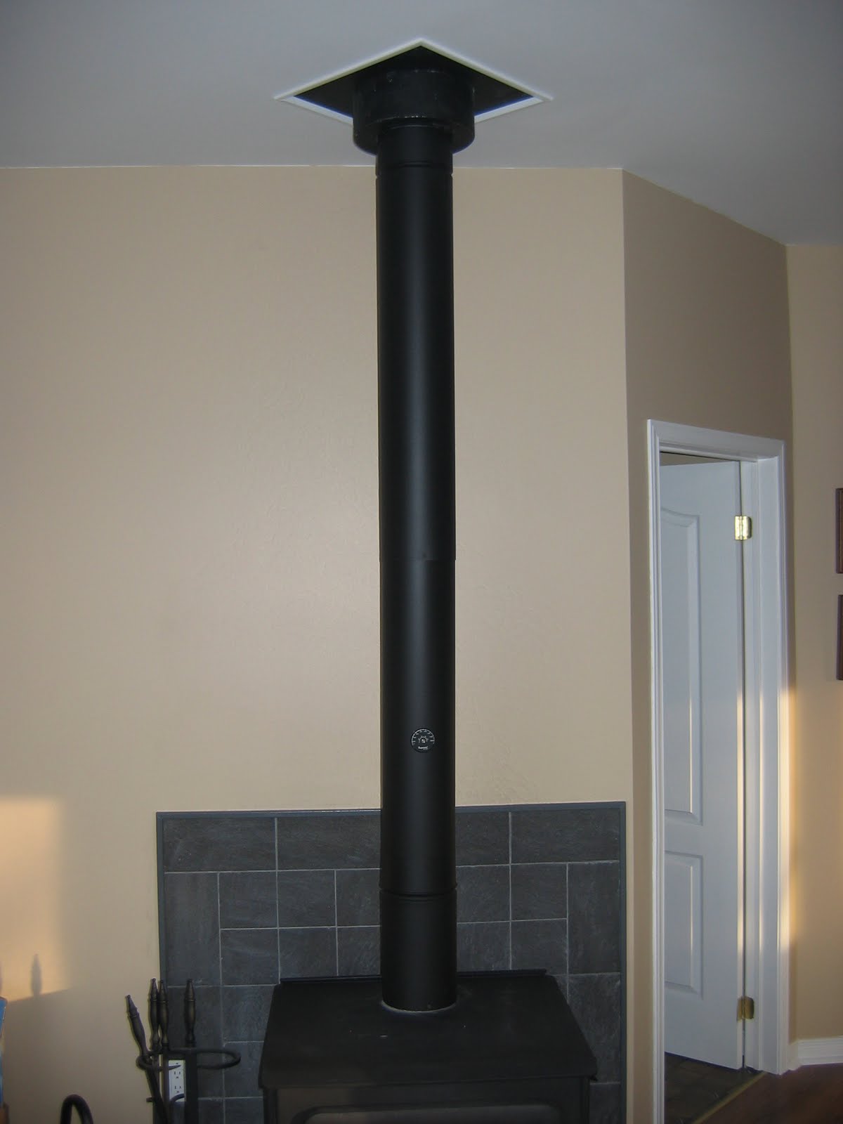 Cottage on the Edge - For Rent...: Installating a Stove Pipe