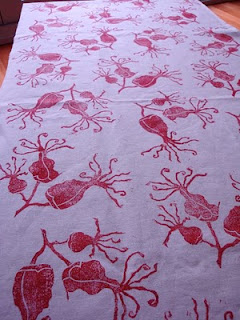 red succulent flower, block printed fabric, repeat pattern