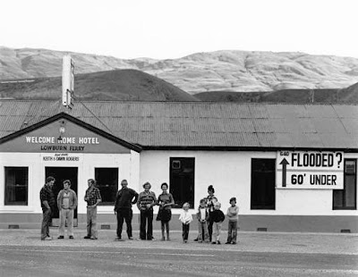 Lowburn's Welcome Home Hotel, built in 1869 and the social focus of the community, was demolished and the area was flooded, '60ft under.'