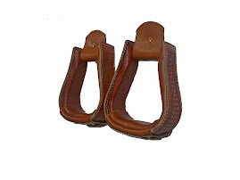Basket stamped leather covered stirrups