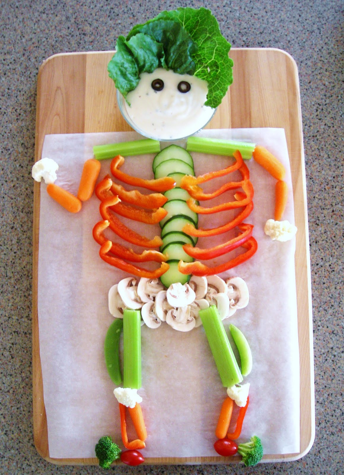 veggie skeleton with celery, carrots and cucumber, see more at http://homemaderecipes.com/healthy/16-halloween-treats/