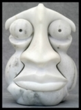 sculpture sur pierre portrait masculin stylisé art humour