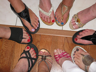 Ladies feet in sandals in a circle