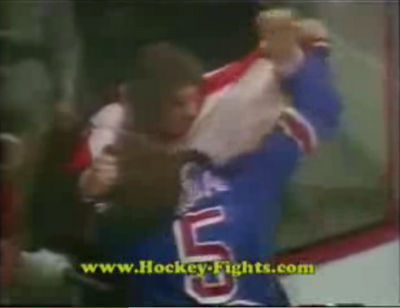 Dave Schultz pulling Dale Rolfe's hair