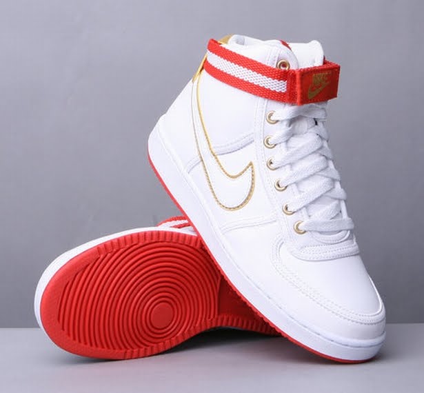red and gold nike trainers
