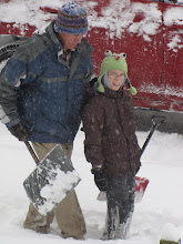 Grandpa and Peter shoveling snow