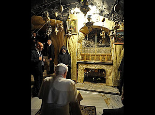 Pope Benedict XVI at grotto at the Church of the Nativity in Bethlehem the place of the Virgin Mary gave birth to Jesus hd(hq) photo