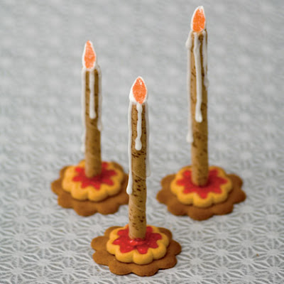 Cookies and Cinnamon Sticks with frosting to make candles