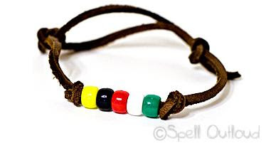 Leather bracelet with yellow, black, red, white, and green beads