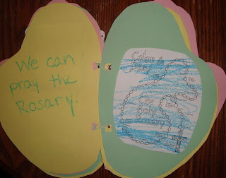 Open page reading "we can pray the rosary"