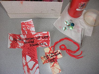 Painted paper crosses with Bible quotes