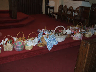 Lineup of baskets on the edge of a stage.