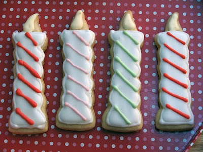 Frosted sugar cookies as striped candles