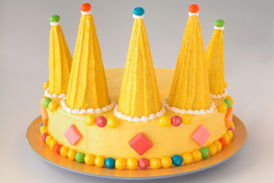 Yellow crown cake with candy toppings