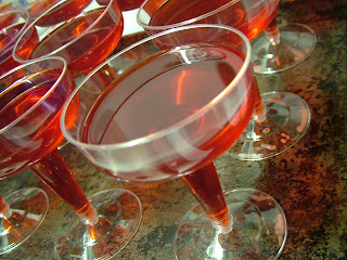 Plastic wine glasses with liquid red Jell-O