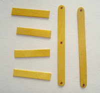 2 full popsicle sticks with 4 segments of popsicle sticks