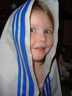 Girl in blue and white veil