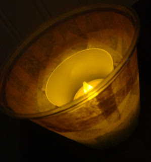 Candle in Decoupaged Cup in the Dark