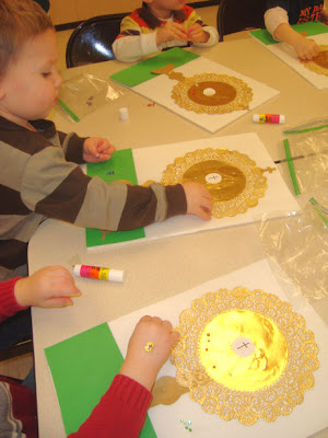 Kids crafting doily monstrance craft