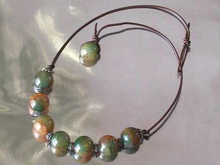 Unusual fire agate polished beads on an adjustable leather cord necklace - $34 SOLD