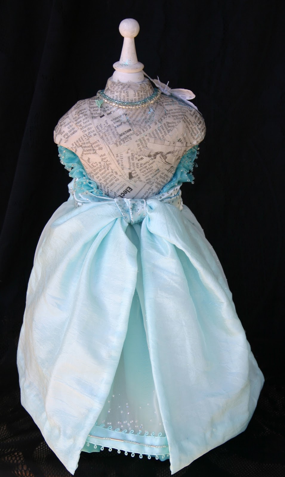 Cherlinink Hand sewn and beaded dress on paper mache dress form.