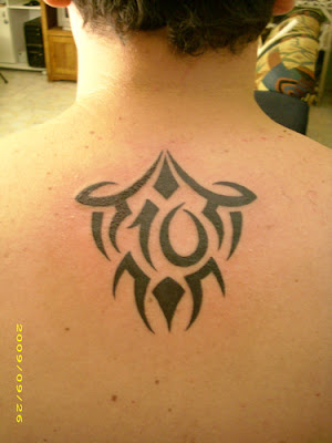 Upper back tribal tattoos