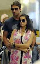 Adriana with fiance Marco Jaric in an airport