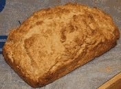 color photograph of a loaf of beer bread type quick bread
