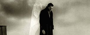 Black and white still of Bruno Ganz as the angel Damiel in Wenders’ film 'Wings of Desire'.