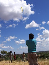 Boy fly kite in Lusaka