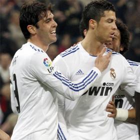 Kaka and Cristiano celebrate the first goal against Real Sociedad