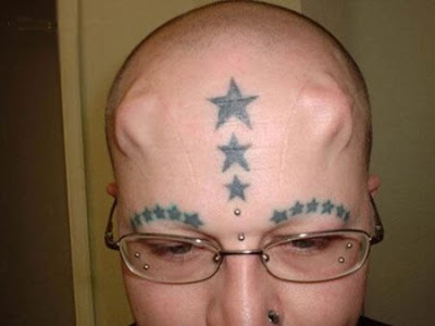 tattoo-piercing-skull-implants.jpg
