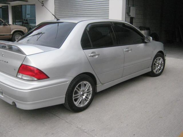 Mitsubishi lancer 2003 года