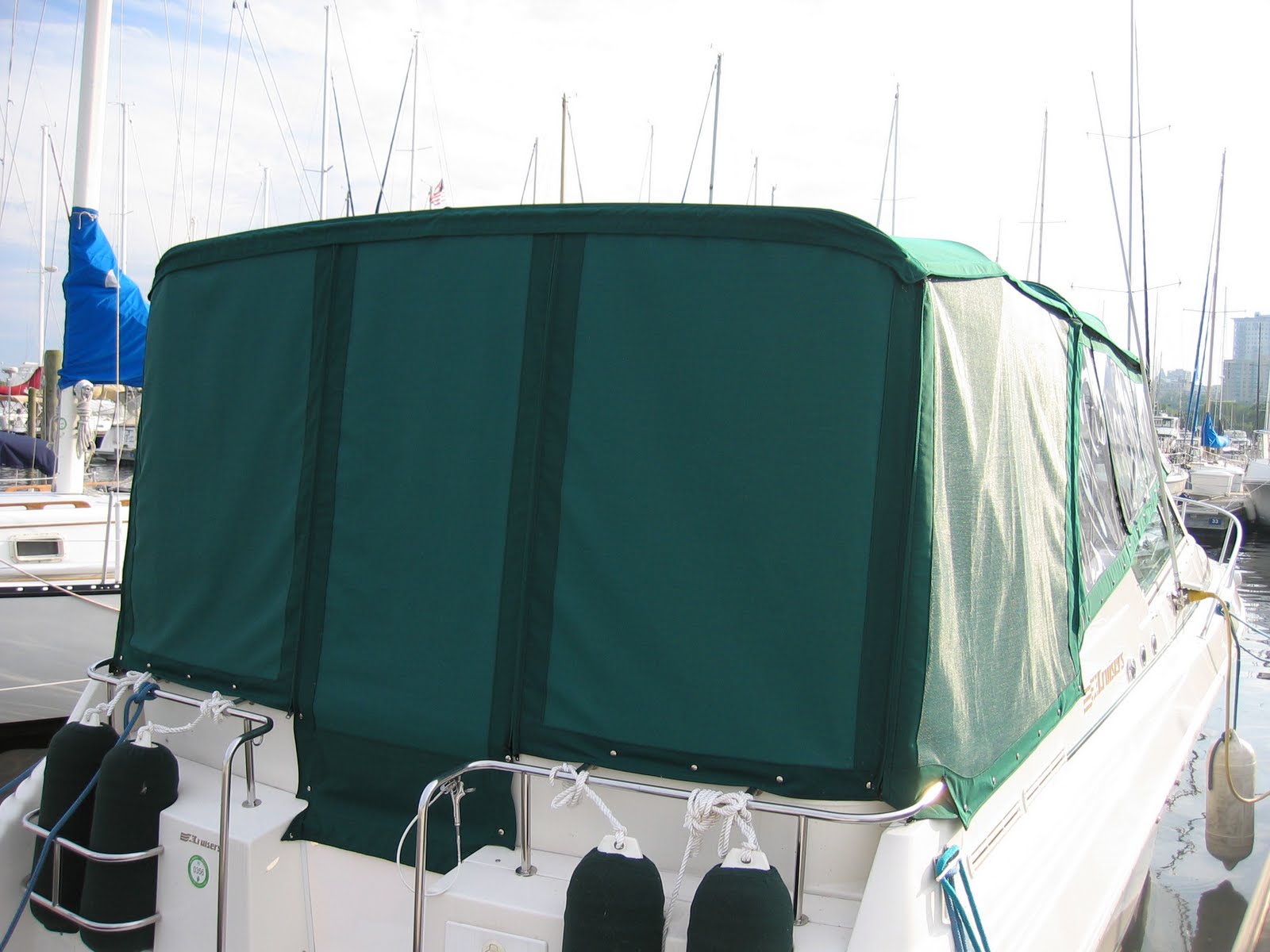 Homestyle Custom Upholstery and Awning Green Boat Enclosure