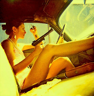 60s+pistol+girl+car+smokes.jpg