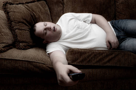 ManOnCouchSnoring.jpg.w560h373.jpg