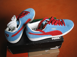 blue and red puma suede