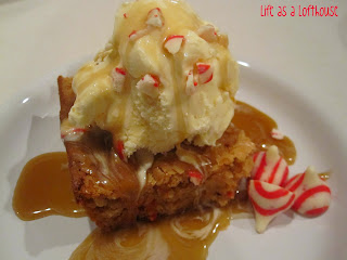 Candy Cane KISS Blondies are soft, buttery blondies filled with candy cane Kisses and topped with a maple butter sauce drizzle. Life-in-the-Lofthouse.com