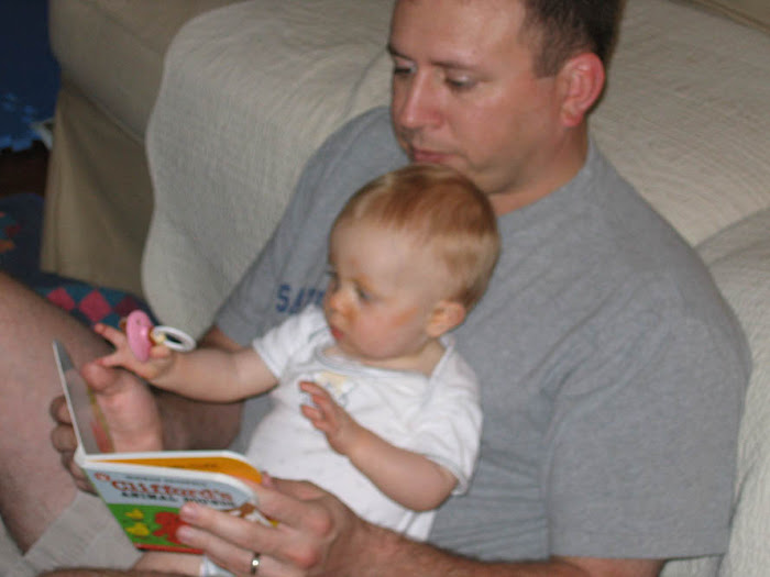 Daddy reading to Laurel