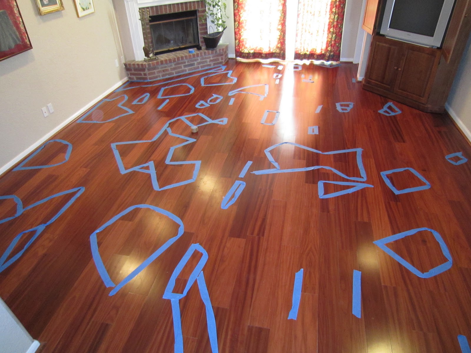 Larry & Paula's New Wood Floor Hollow Spots in Living Room